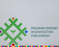 Logo programy - romb, w jego środku listek, na rogach kwadraty.